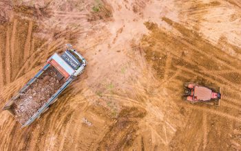 dump-truck-unloads-soil-on-the-construction-site-2022-11-09-04-50-20-utc